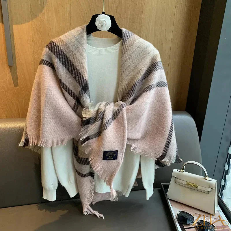 Raw hem plaid scarf by Trendsi featuring a cozy, stylish plaid pattern and fringed edges, perfect for fall and winter accessories.