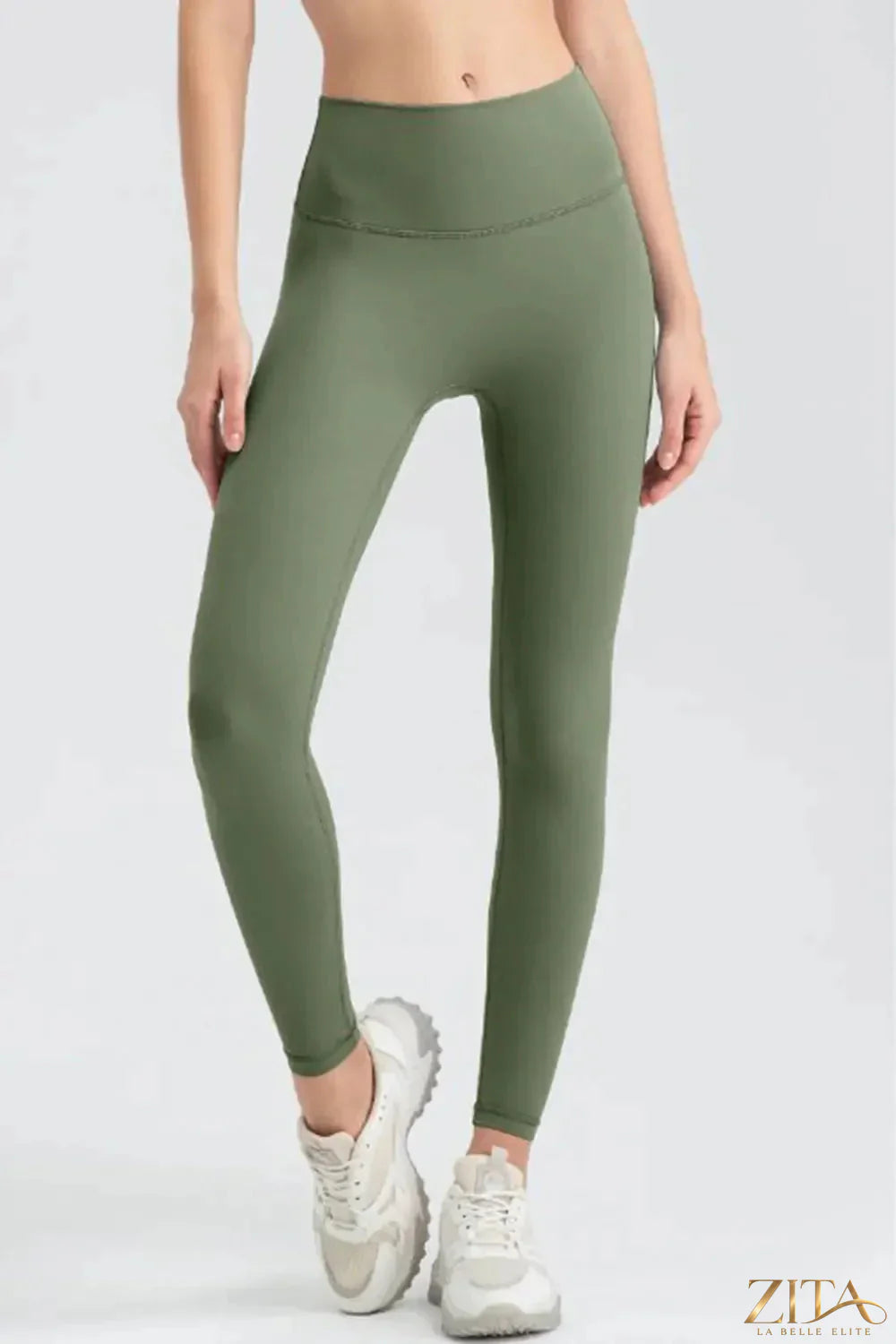 Trendsi wide waistband sport leggings in black, showing a close-up of the high-rise, stretchy fabric and smooth fit for active wear.