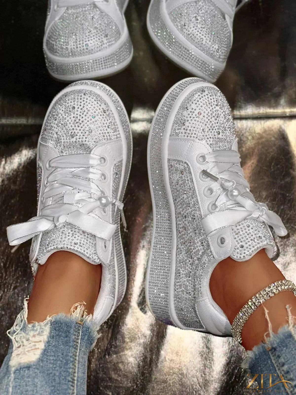 Zita La Belle Elite round toe rhinestone sneakers with sparkling embellishments and white rubber soles.
