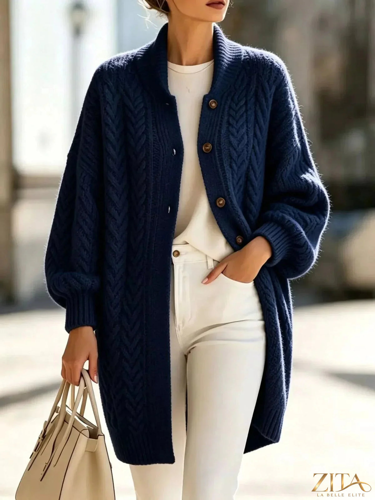 Plus size cable-knit button-down cardigan by Zita La Belle Elite, featuring a cozy full-size knit with front buttons.
