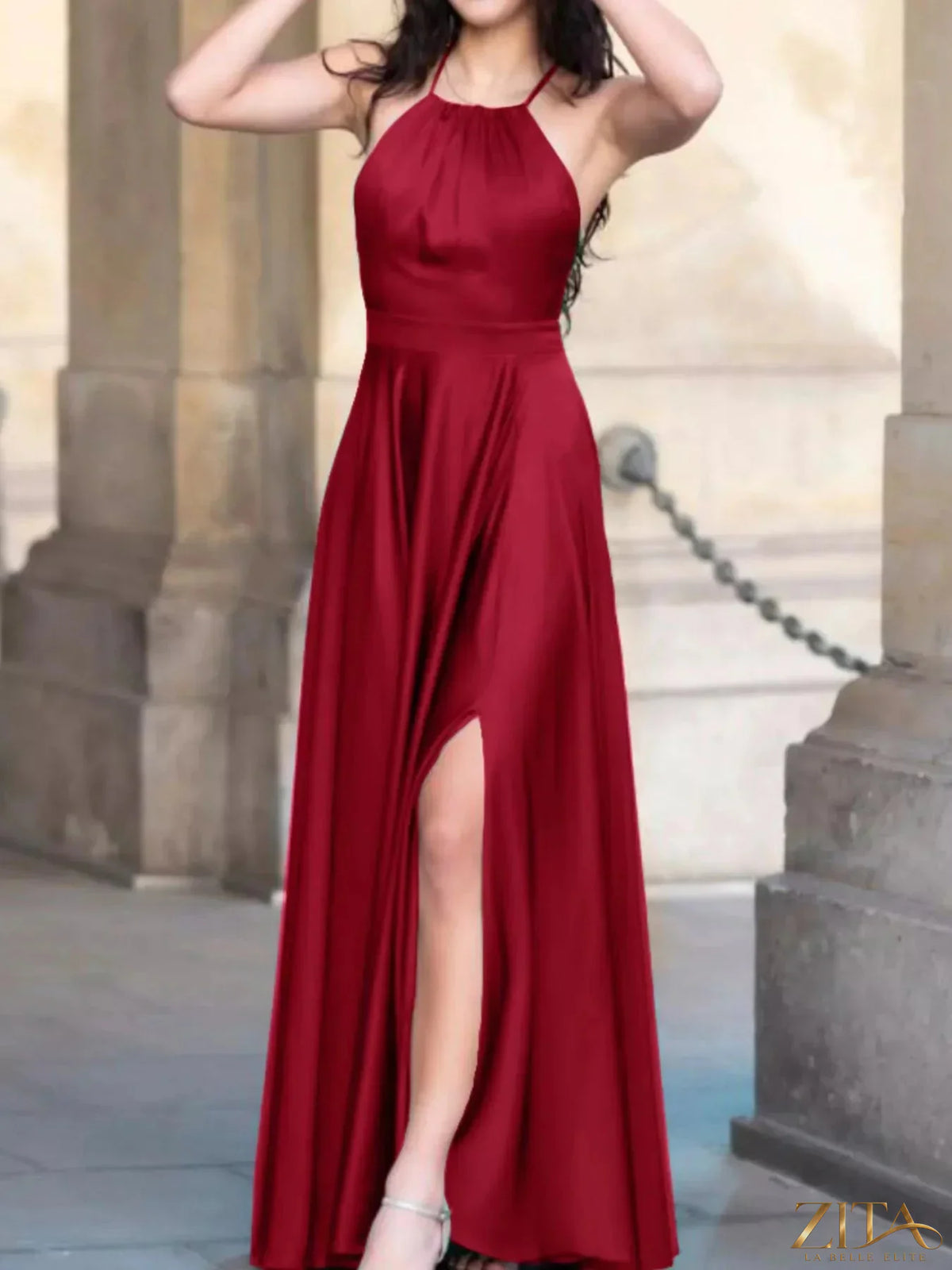 Zita La Belle Elite halter neck slit maxi dress in flowy fabric, featuring a fitted bodice and elegant slit for a stylish look