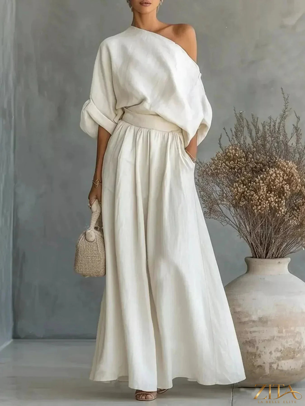 Plus size Zita La Belle Elite one-shoulder top and wide-leg pants set displayed on a model with stylish fit and flowing fabric.