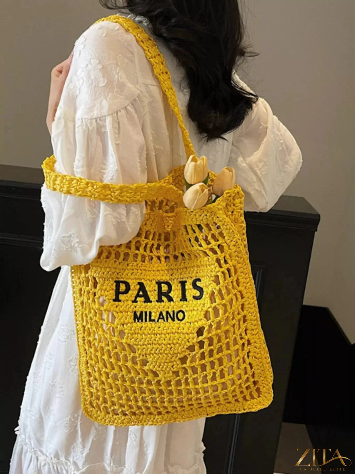 Crochet knit shoulder bag by Zita La Belle Elite with a textured pattern and spacious interior, stylish for casual outings.