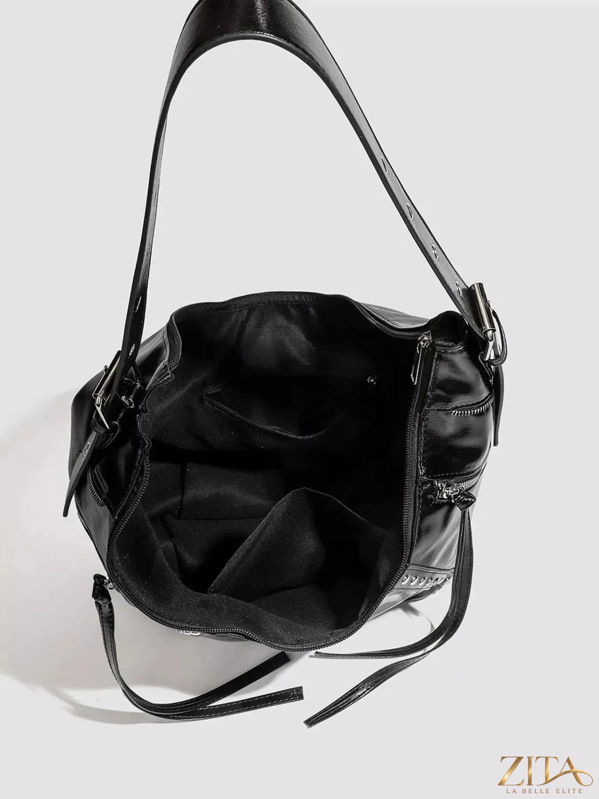 Zita La Belle Elite studded patent leather hobo shoulder bag with silver hardware and spacious design.