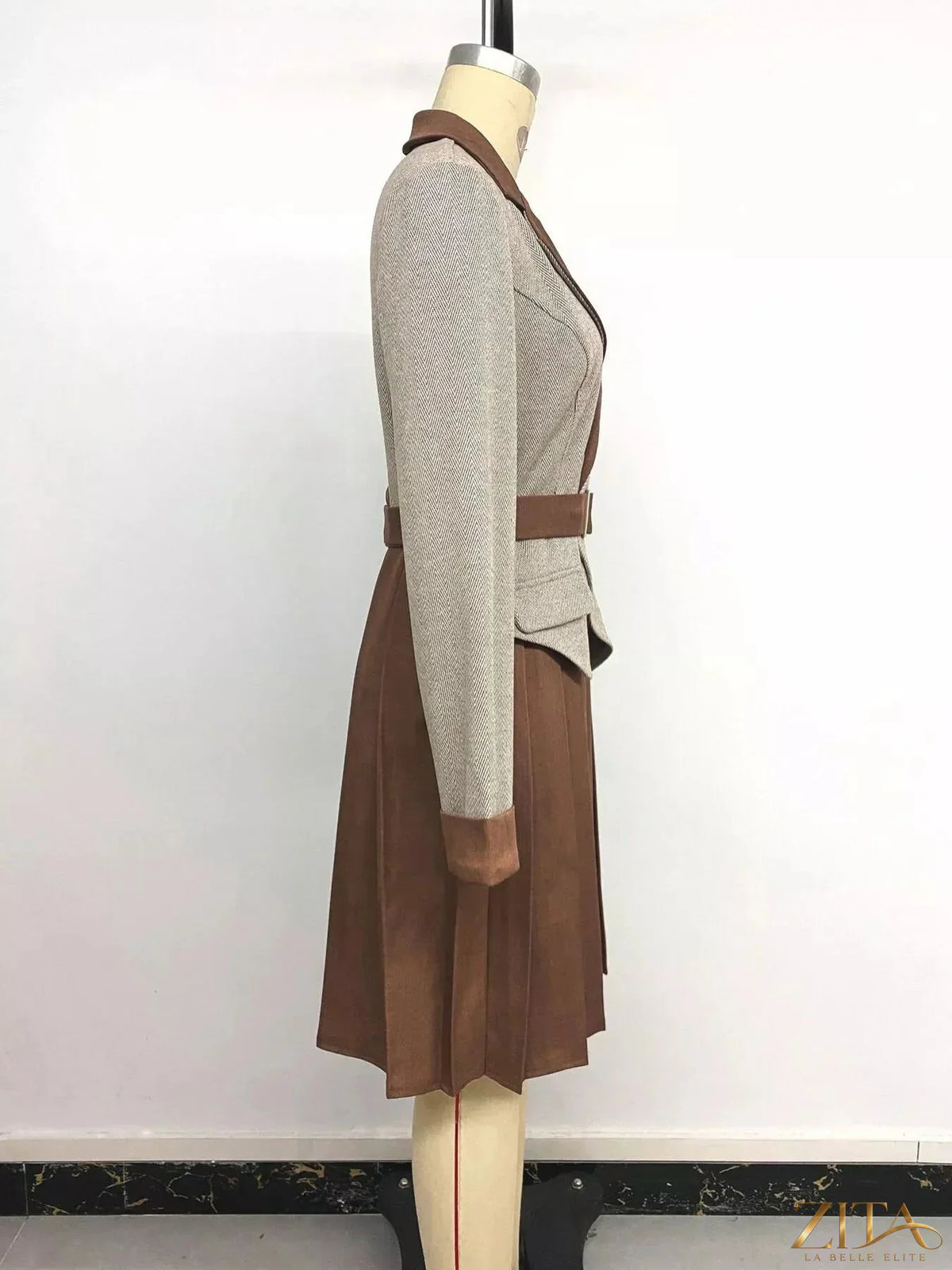 Zita La Belle Elite pleated patchwork blazer belt dress featuring a stylish, fitted design with a mix of fabrics and a waist belt.
