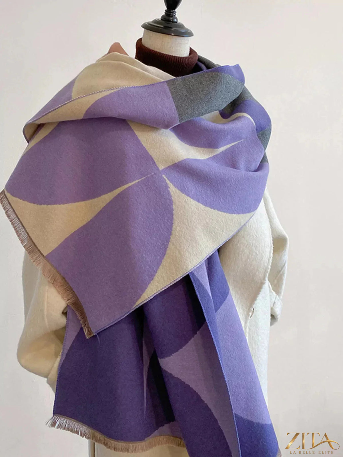 Contrast raw hem scarf by Trendsi featuring soft fabric, fringe edges, and stylish design perfect for accessorizing outfits.
