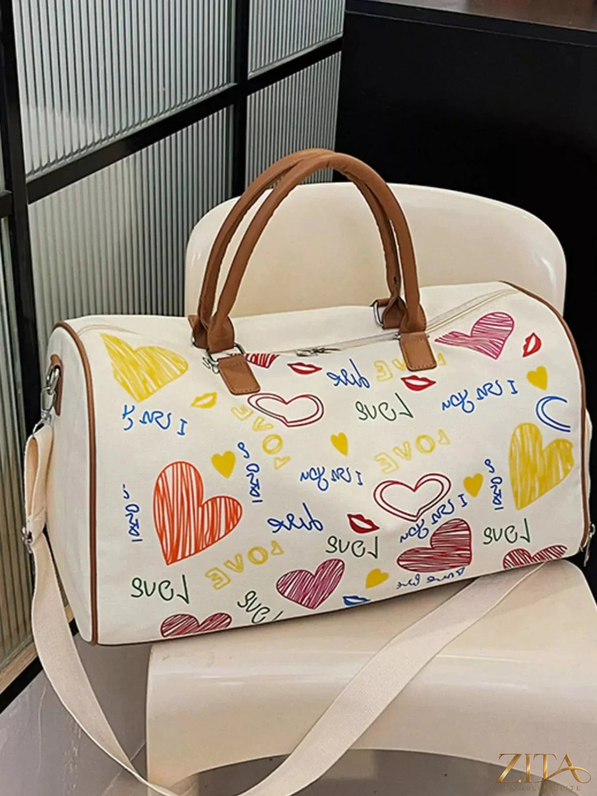 Zita La Belle Elite printed duffel bag with adjustable strap, featuring stylish design and spacious interior for travel or gym use.
