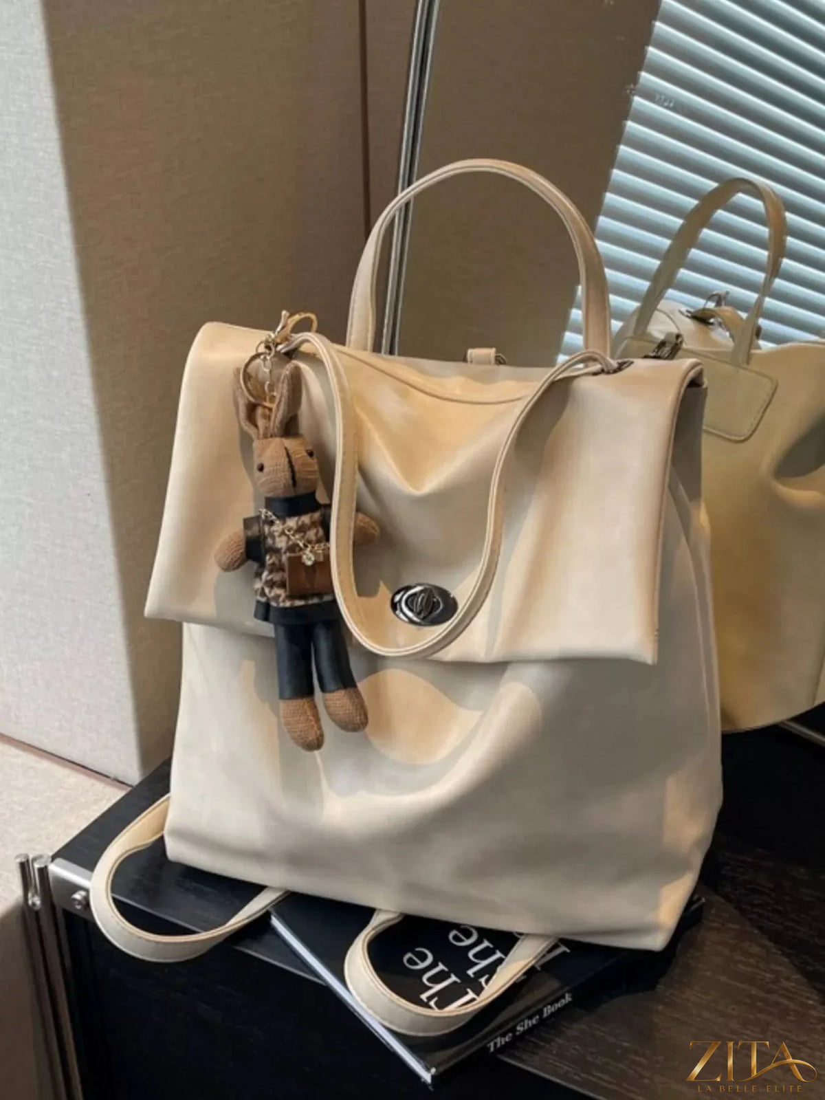 Leather flap backpack bag from Trendsi featuring a stylish, brown leather design with adjustable straps and a front flap closure.