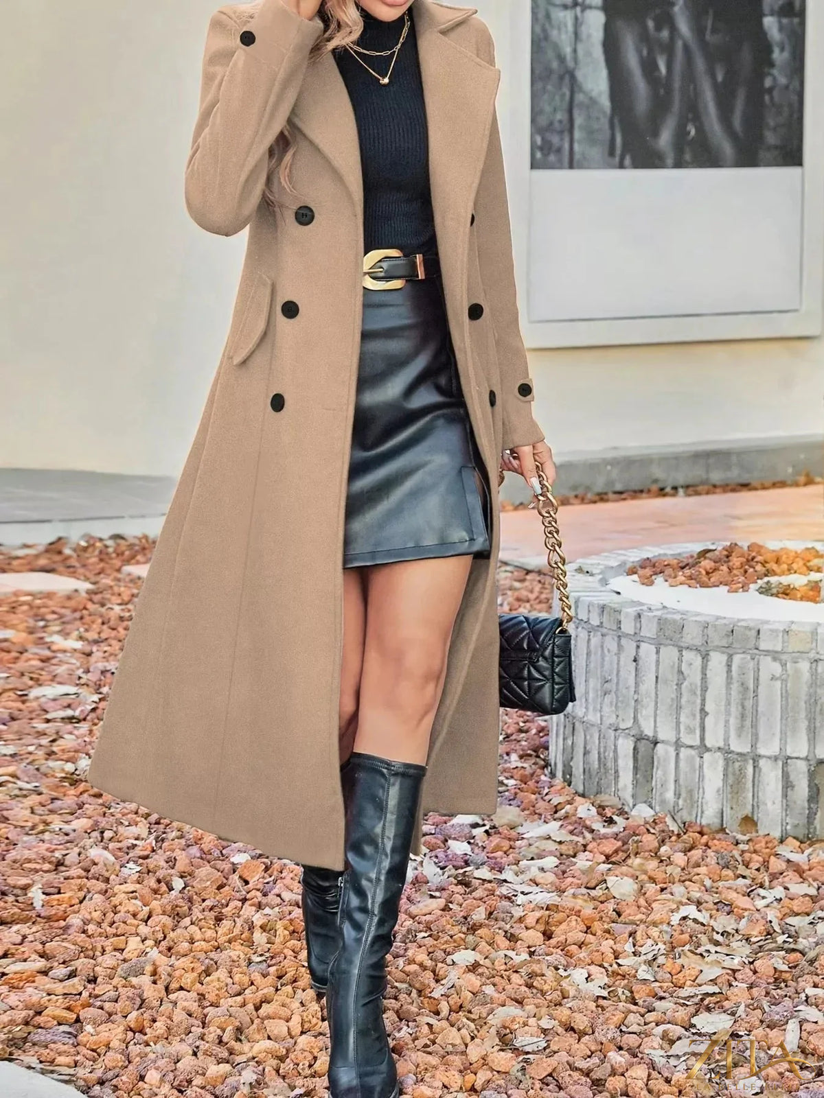 Zita La Belle Elite double-breasted longline coat in neutral fabric, styled with wide lapels and a tailored fit.