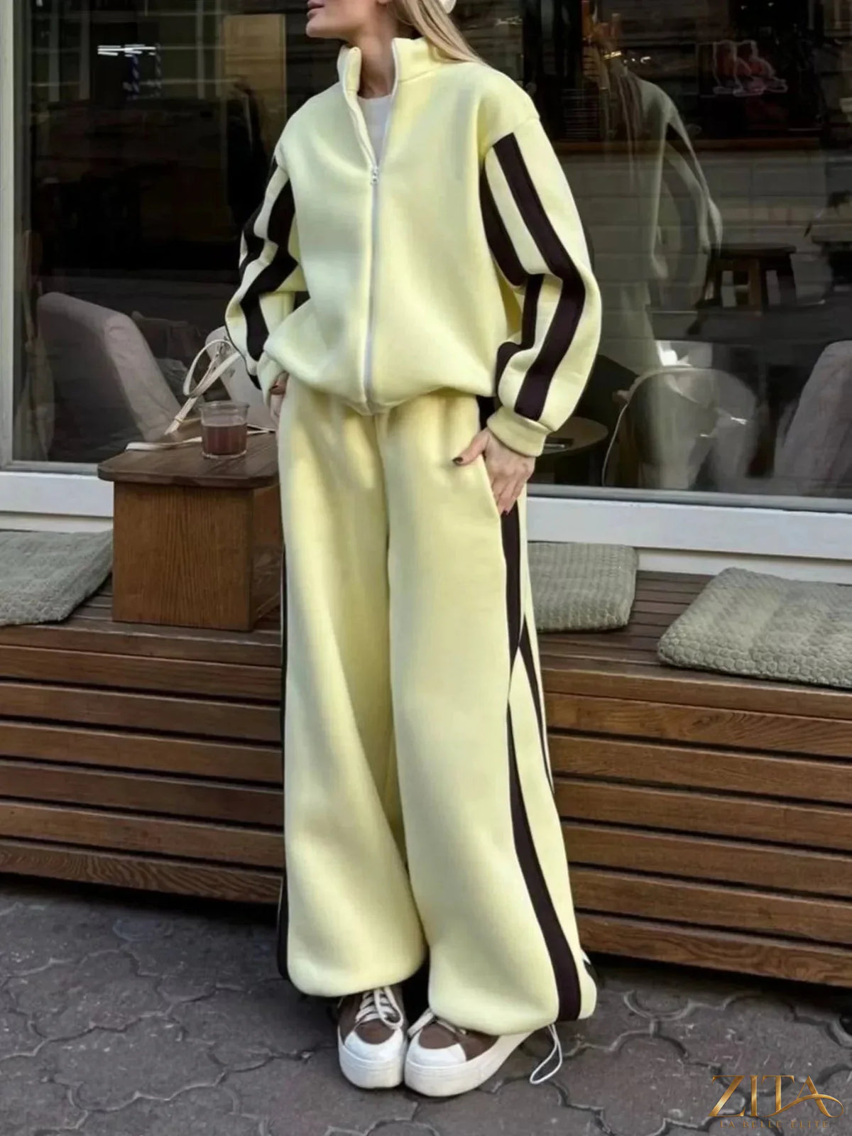Zita La Belle Elite contrast striped zip-up top and pants set, featuring a stylish matching two-piece outfit with bold patterns.