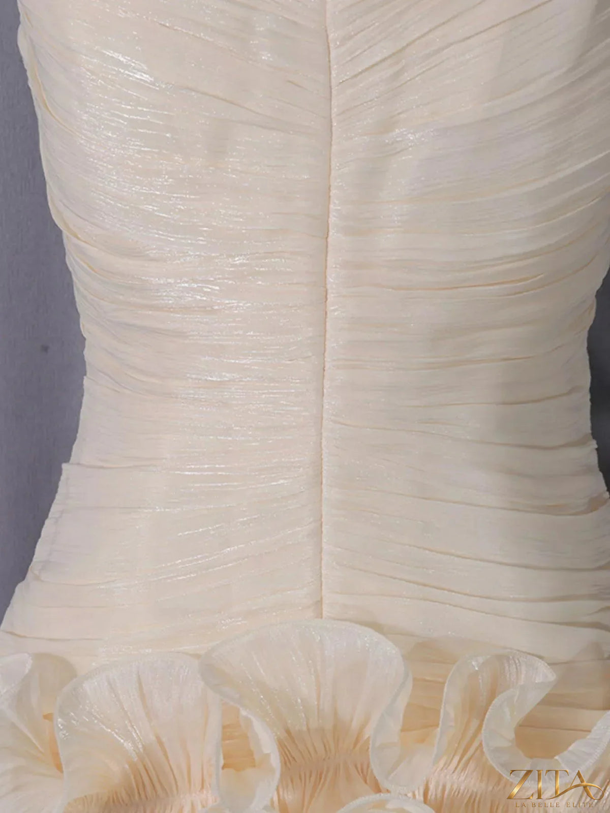 Strapless ruffle ruched mini dress by Trendsi featuring a fitted bodice, ruffle details, and a stylish mini length.