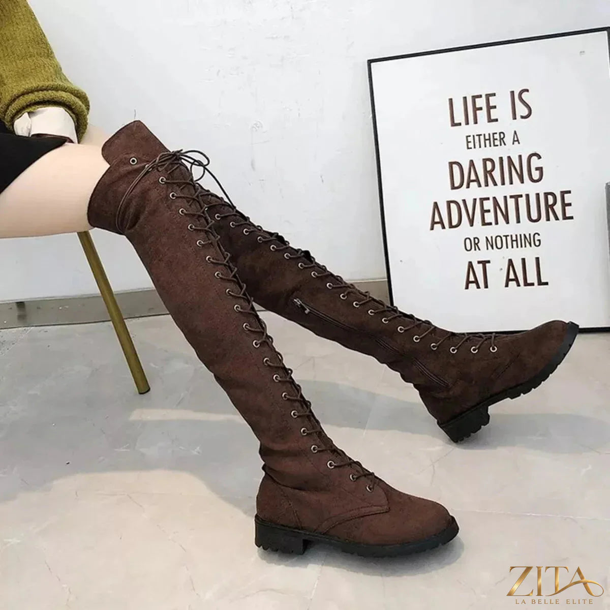 Over-the-knee lace-up boots by Trendsi featuring black leather with pointed toes and chunky heels.