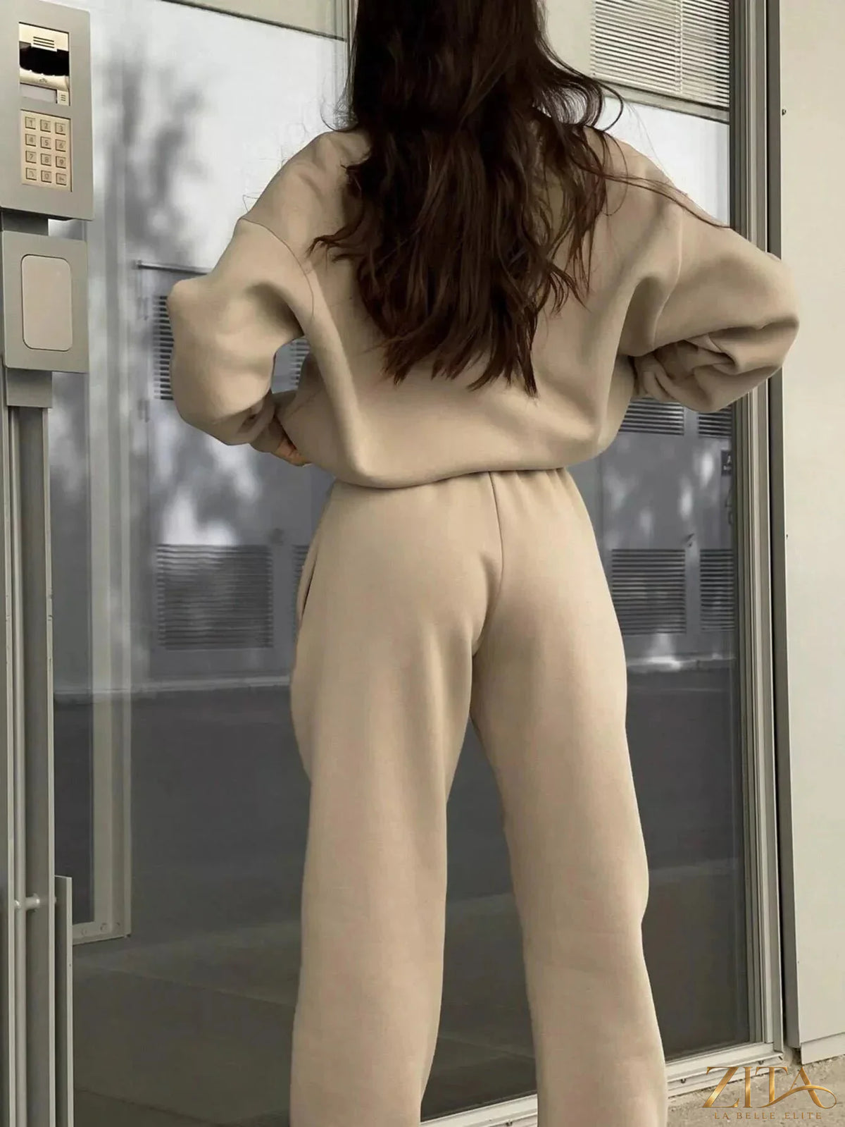 Zita La Belle Elite half zip sweatshirt and matching pants set in soft fabric, shown on a hanger with a neutral background.