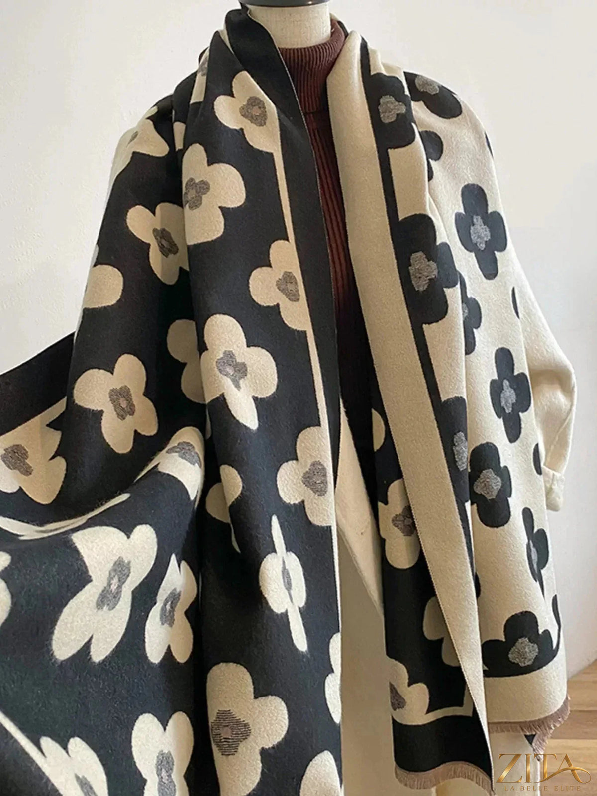 Floral print raw hen scarf by Zita La Belle Elite featuring vibrant floral patterns and lightweight fabric.