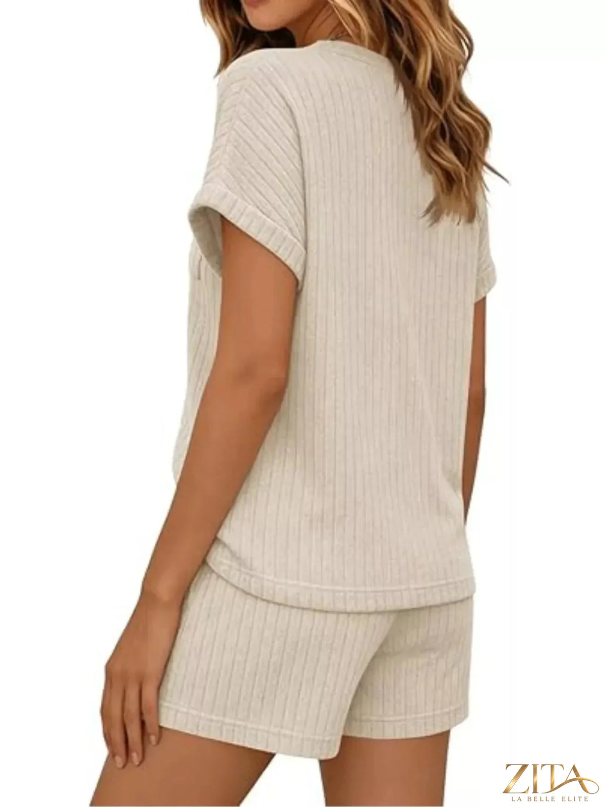 Casual ribbed knit tee and shorts set by Trendsi, featuring a relaxed fit with soft ribbed fabric in a coordinated loungewear style.