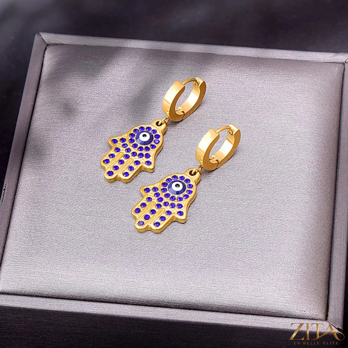 18K gold-plated hand charm jewelry set featuring intricate hand-shaped pendants and matching earrings in a stylish design