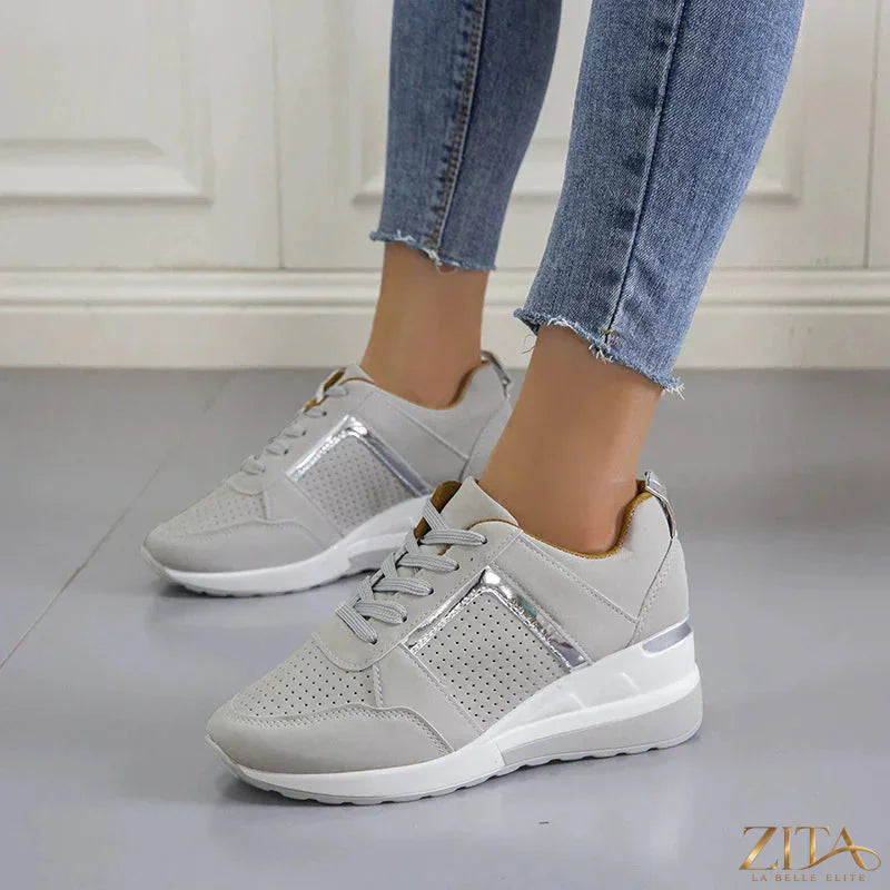 Zita La Belle Elite lace-up wedge sneakers with stylish design, featuring white laces and a comfortable wedge heel.