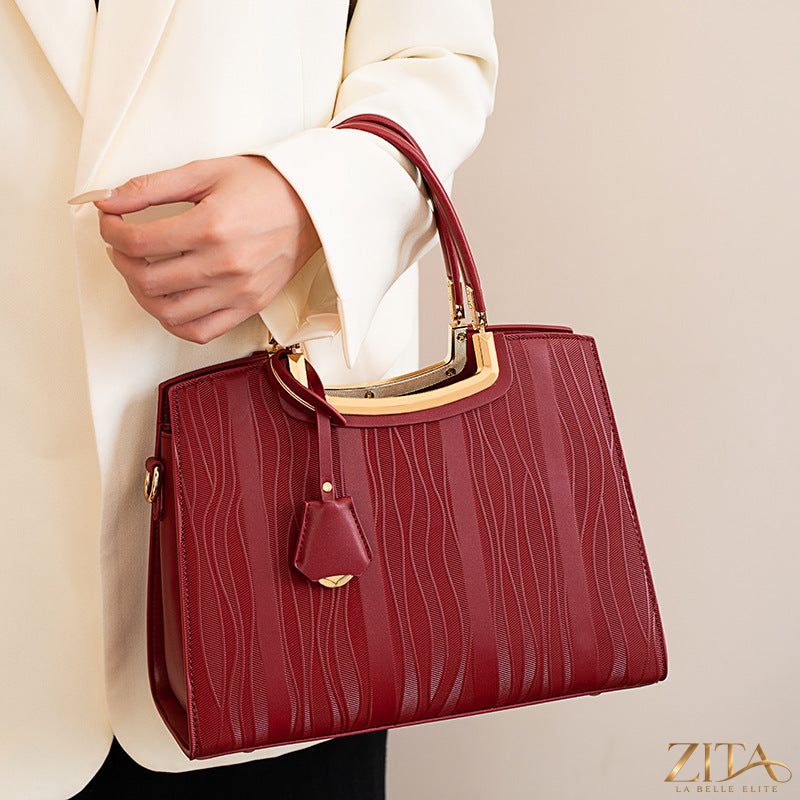 Zita La Belle Elite leather top handle handbag with sturdy handles and smooth finish, stylish for everyday use.