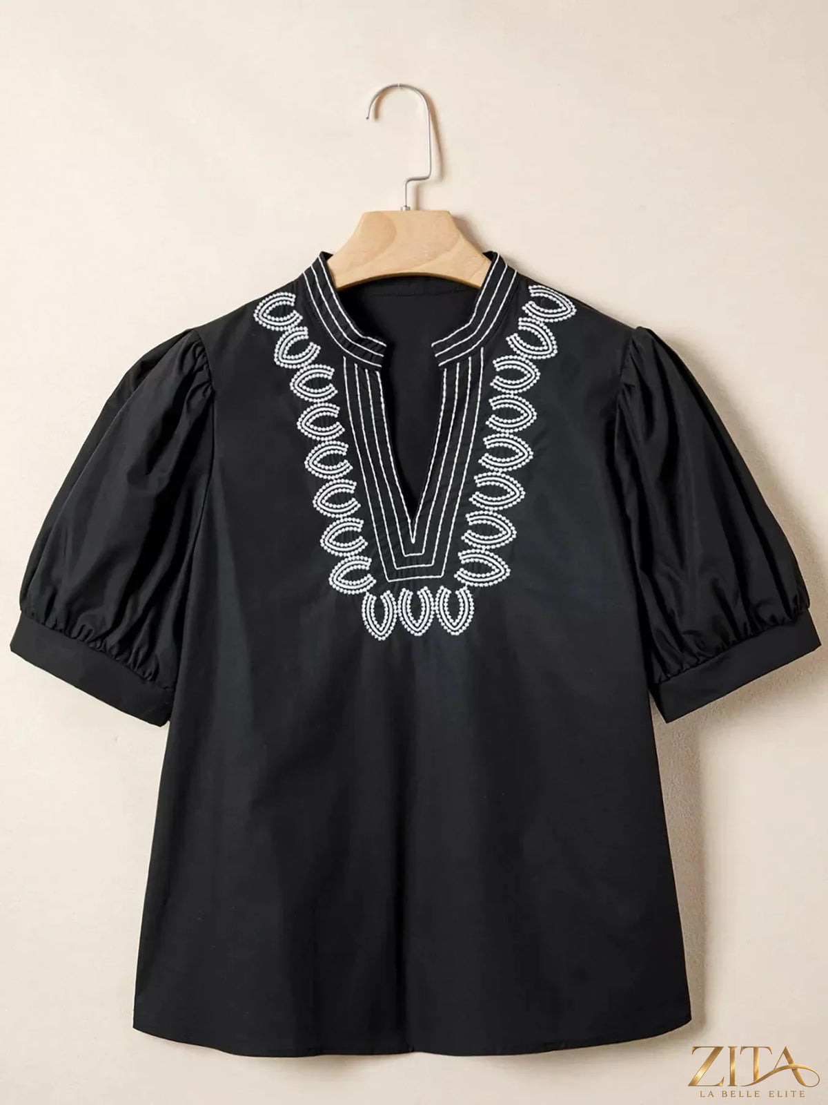 Zita La Belle Elite notched puff sleeve blouse with ruffled collar and floral pattern, stylish and elegant women’s top.