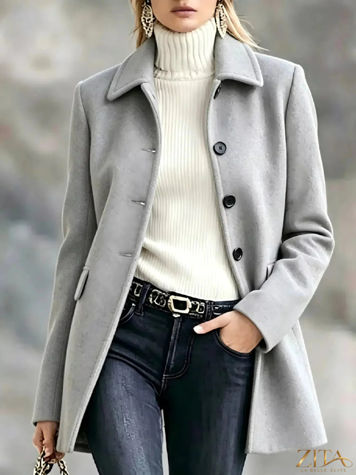 Zita La Belle Elite button-up coat with collared neck, showcasing a stylish, tailored outerwear design in a neutral fabric.