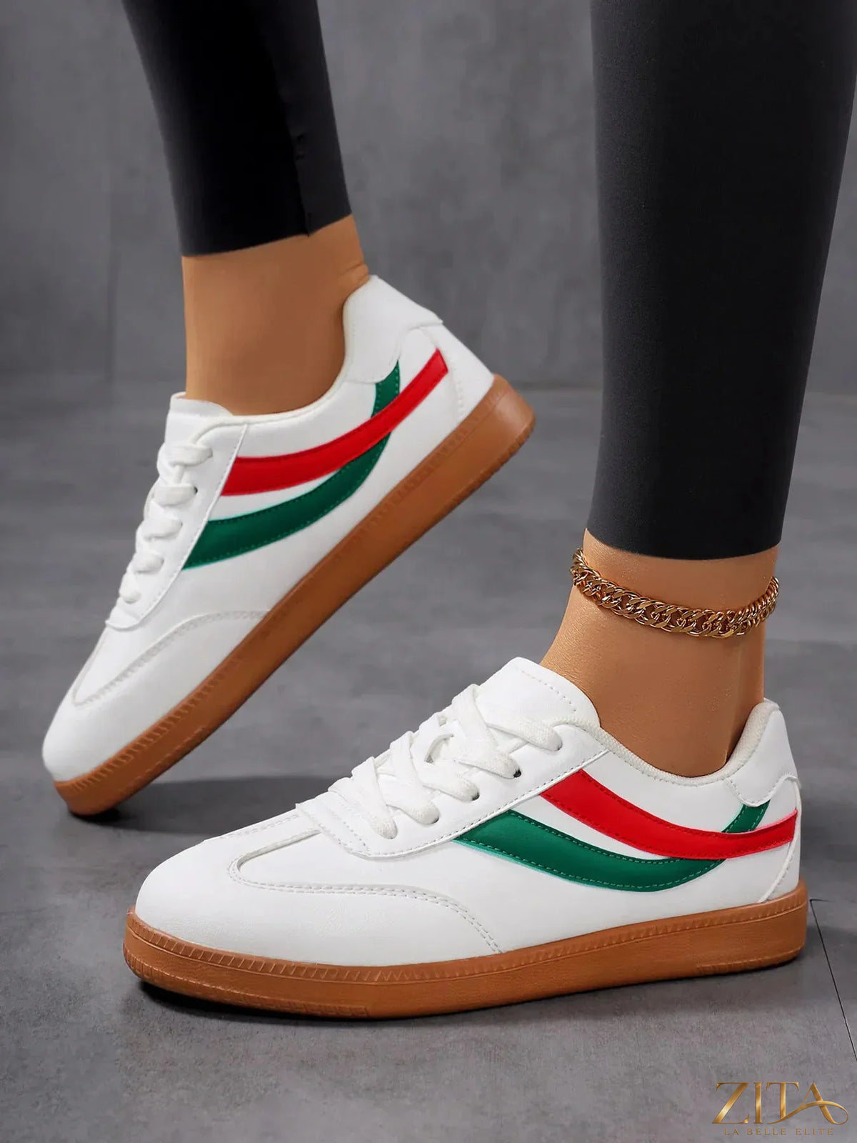 Zita La Belle Elite lace-up flat sneakers with stripe accent, featuring white and navy design and casual slip-on style.