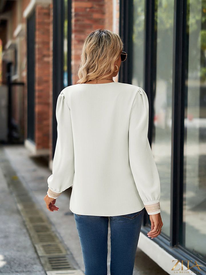Zita La Belle Elite V-neck long sleeve blouse in soft fabric, featuring a flattering fit and elegant design.