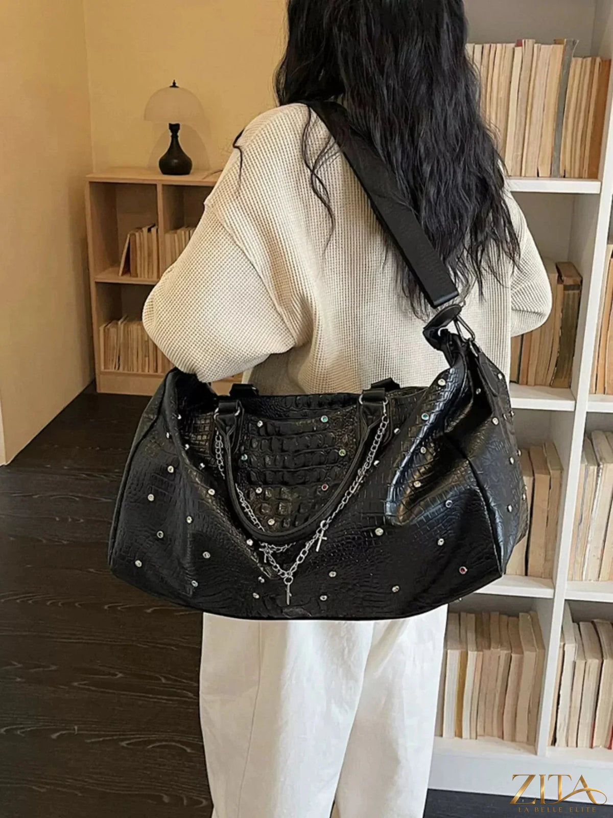Zita La Belle Elite studded large capacity travel bag with multiple compartments and sturdy handles for travel convenience.