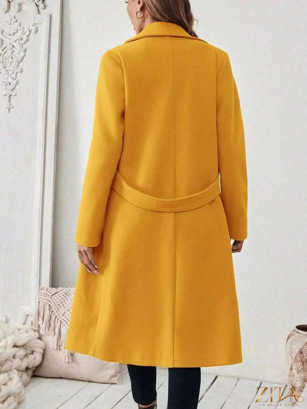 Zita La Belle Elite single-button longline coat draped over a mannequin, showcasing its sleek design and tailored fit.