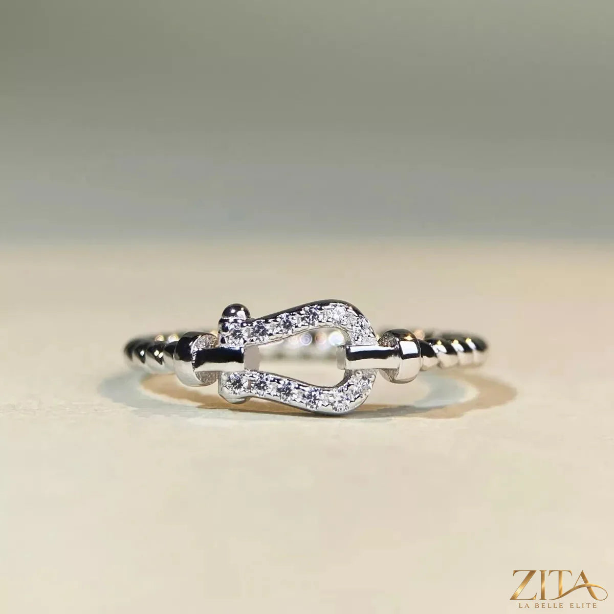 925 Sterling Silver Zircon Horseshoe Shaped Ring by Zita La Belle Elite, featuring a shiny horseshoe design with sparkling zircon stones.