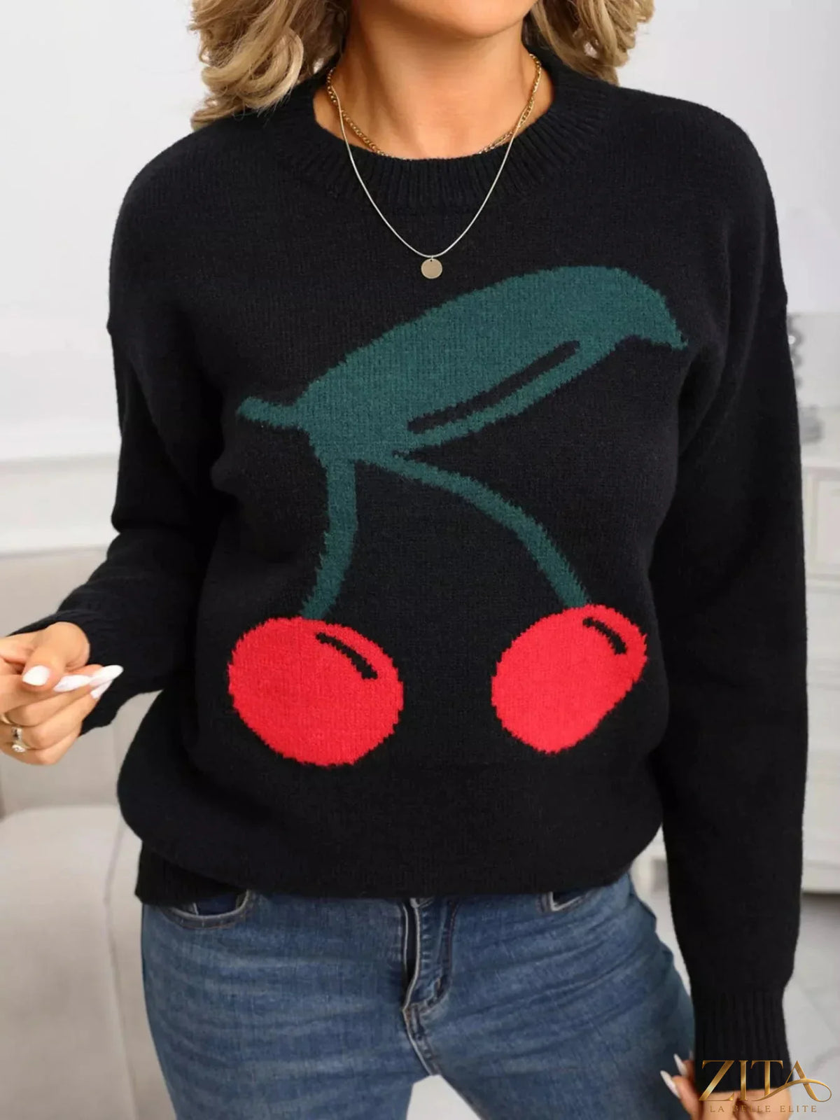 Cherry-colored round neck sweater by Trendsi, showcasing a cozy knit fabric and classic fit, ideal for casual wear.