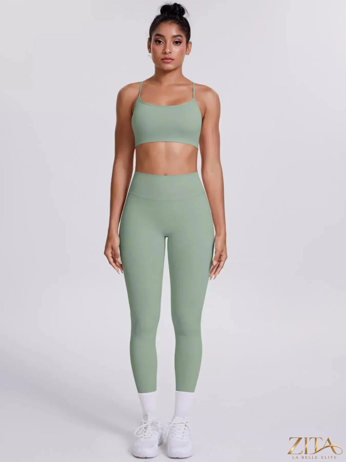 Zita La Belle Elite criss-cross back cami top and matching black leggings active set on a model, ideal for workout or yoga sessions.