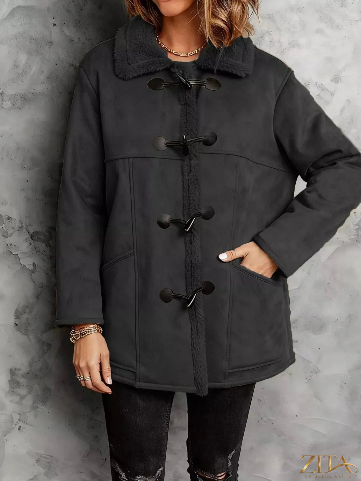 Zita La Belle Elite faux suede toggle coat with sherpa lining, featuring a stylish collar and toggle buttons on a model.