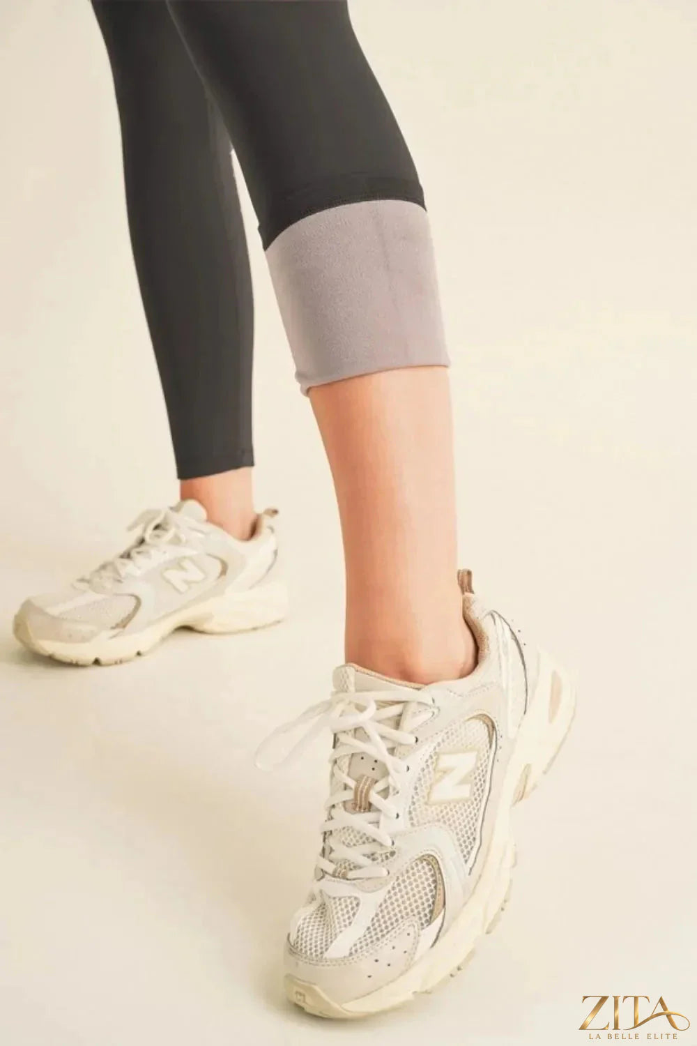 Yelete fleece-lined high-waisted leggings in black, showing the cozy, full-length design with a comfortable waistband.