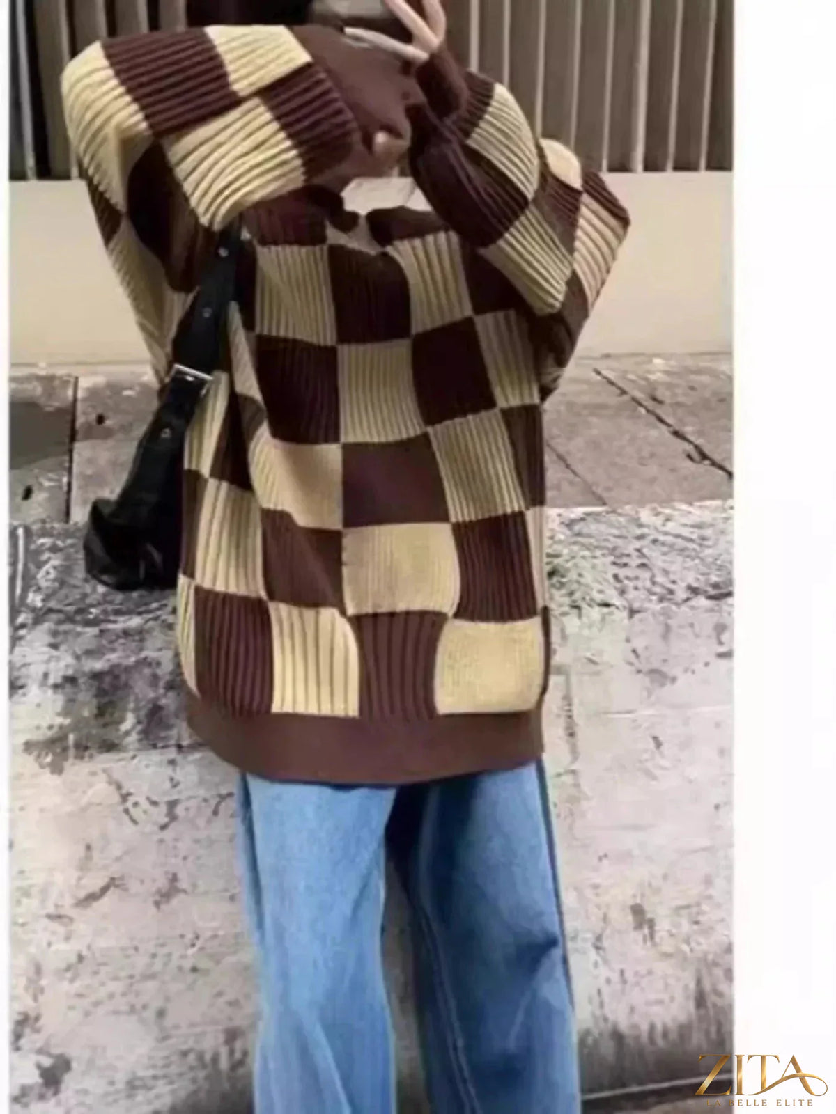 Zita La Belle Elite oversized sweater with black and white checkerboard pattern, cozy knit, and relaxed fit.