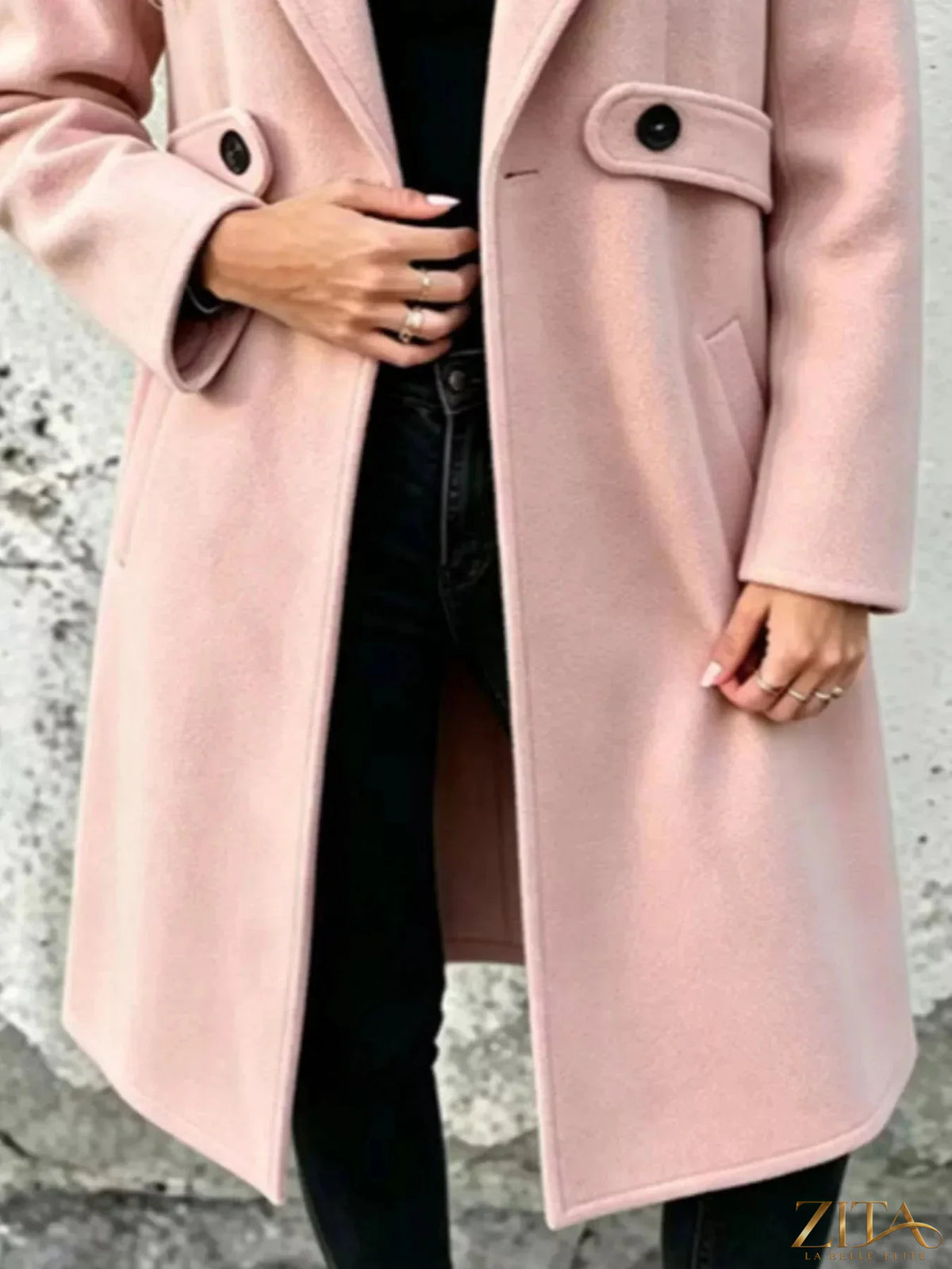 Plus size Zita La Belle Elite longline overcoat with lapel collar and full size design, shown on a model in a city setting