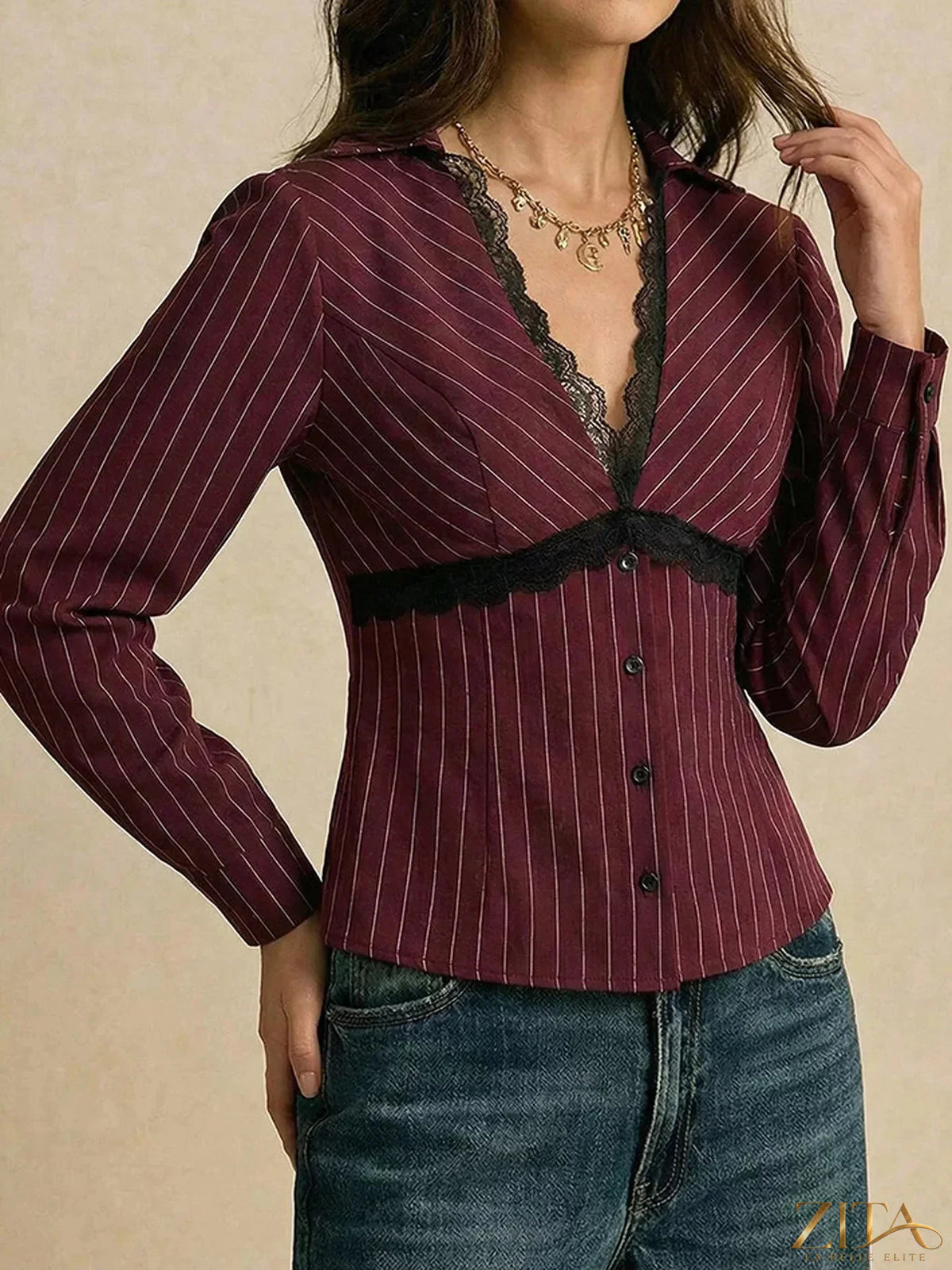 Zita La Belle Elite lace trim V-neck blouse featuring delicate lace details and a flowing fabric, perfect for casual or dressy wear.