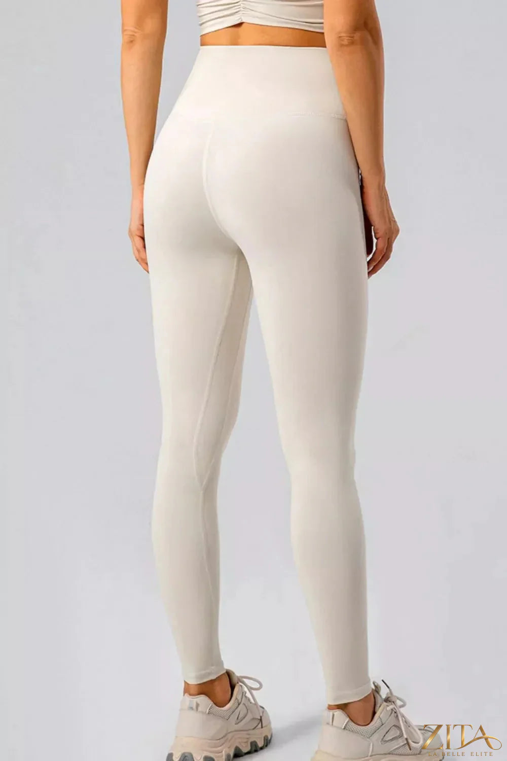 High-waisted seamless active leggings from Trendsi, shown in black with a snug fit and elastic waistband for workout comfort.