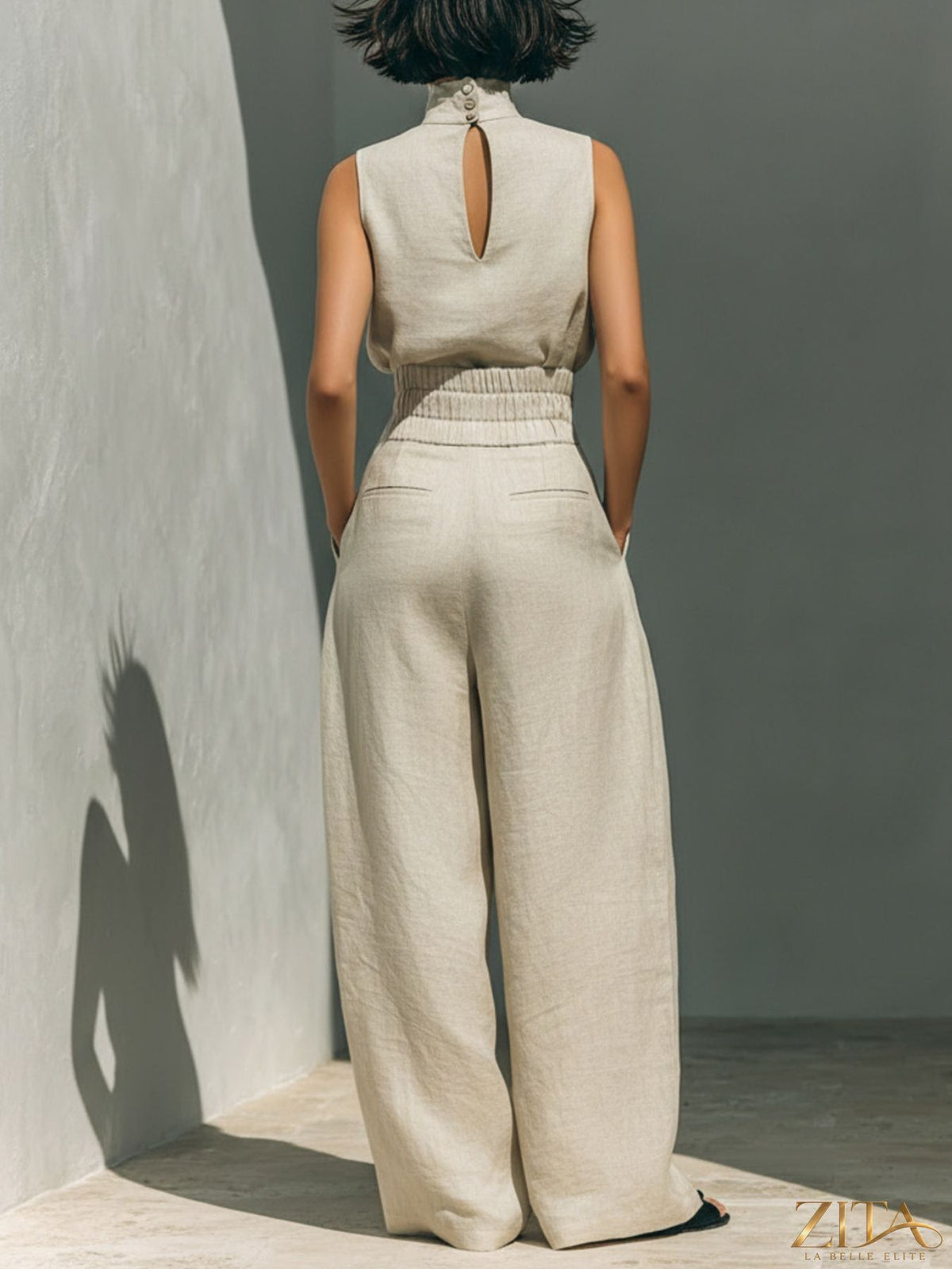 Zita La Belle Elite sleeveless turtleneck top and matching pants set in a stylish, fitted design, shown in a neutral color.