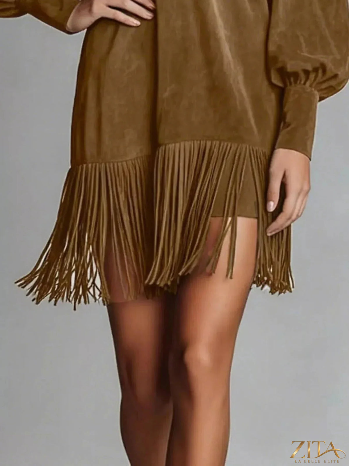 Fringed Lantern Sleeve Dress by Trendsi featuring flowy fabric, lantern sleeves, and fringe details for a stylish look