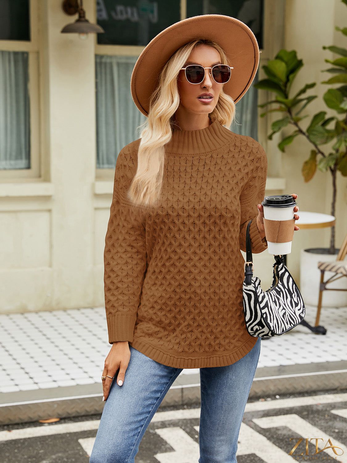 Zita La Belle Elite mock neck slit sweater in soft knit fabric, featuring a high neckline and side slit detail for stylish comfort.
