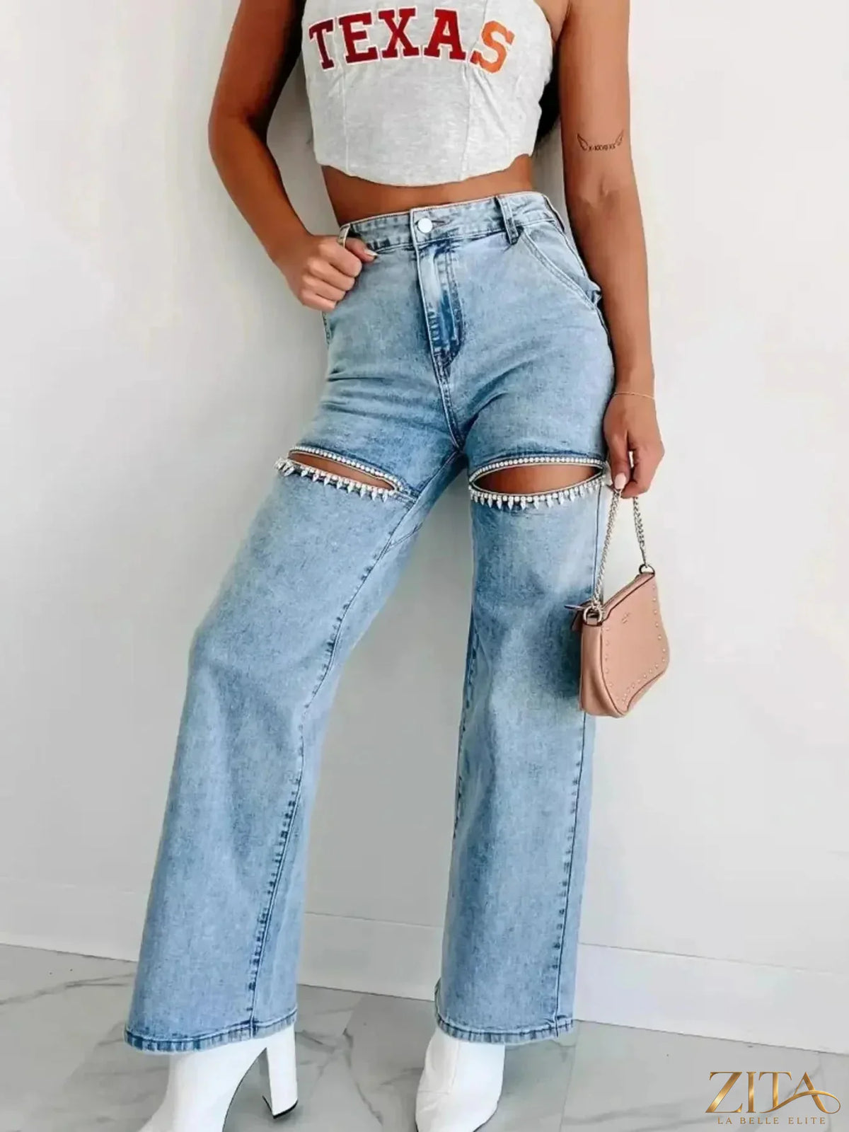 Zita La Belle Elite high waist cut-out wide leg jeans with stylish design and distressed details, shown on model.