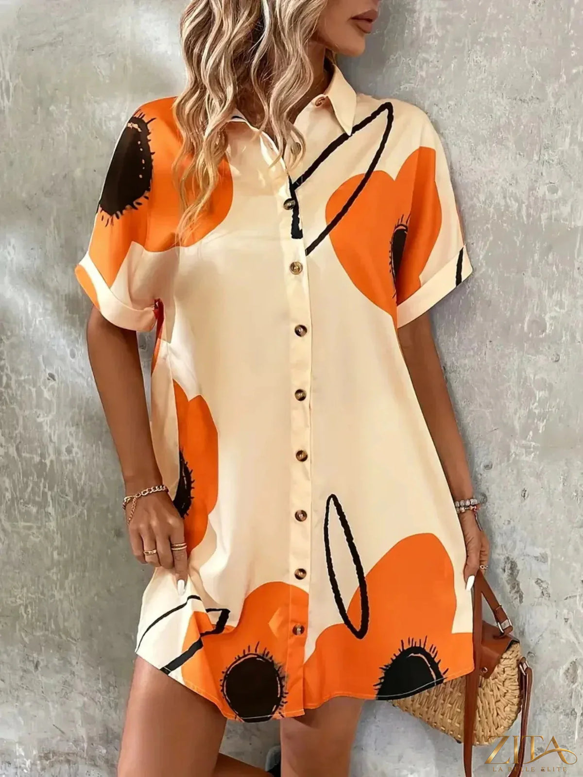 Printed button-front shirt dress by Zita La Belle Elite, featuring a stylish collar, long sleeves, and a vibrant floral pattern.