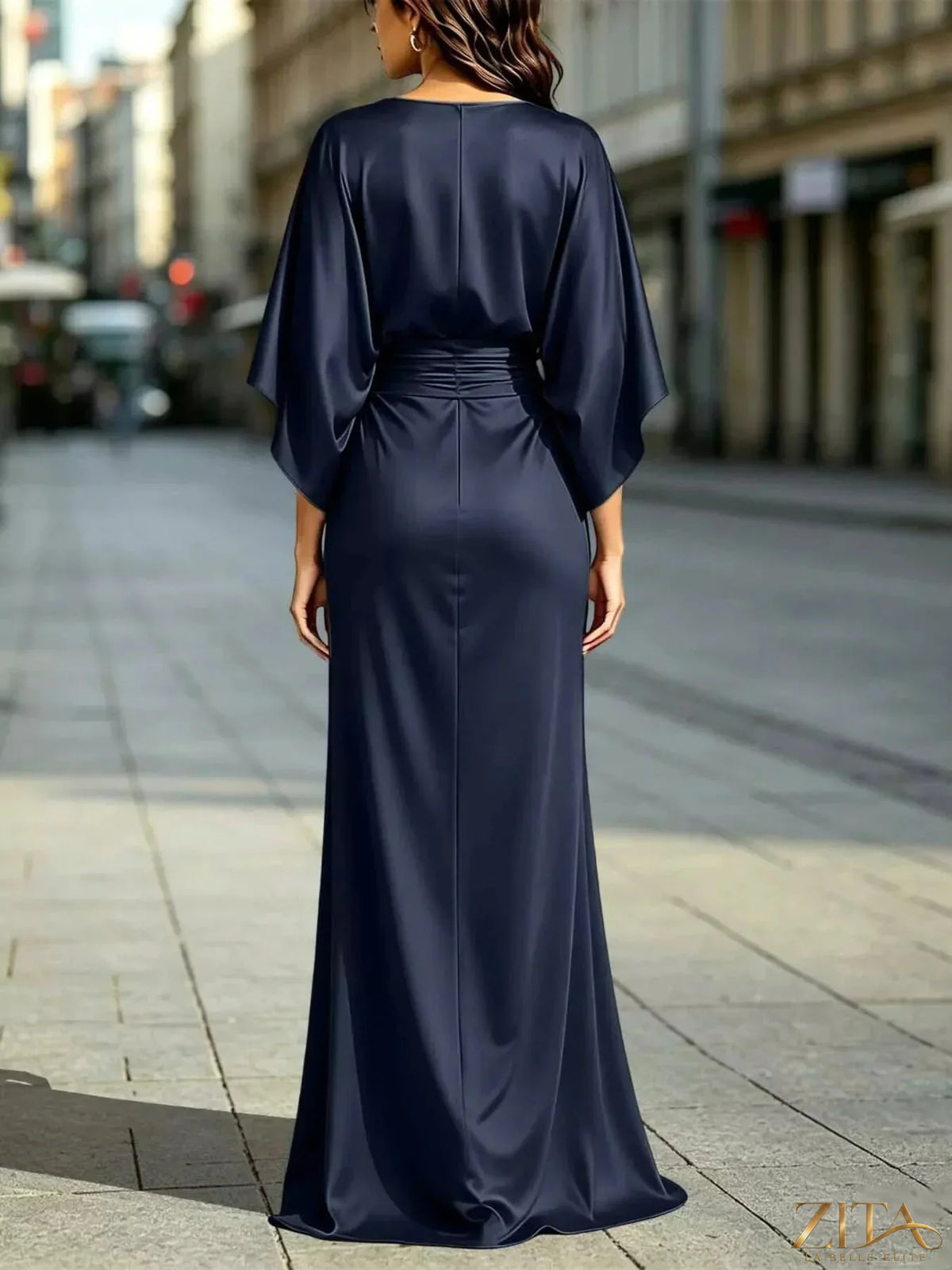 Zita La Belle Elite ruched waist maxi dress with pockets, flowing fabric, and a fitted bodice, ideal for elegant casual wear.