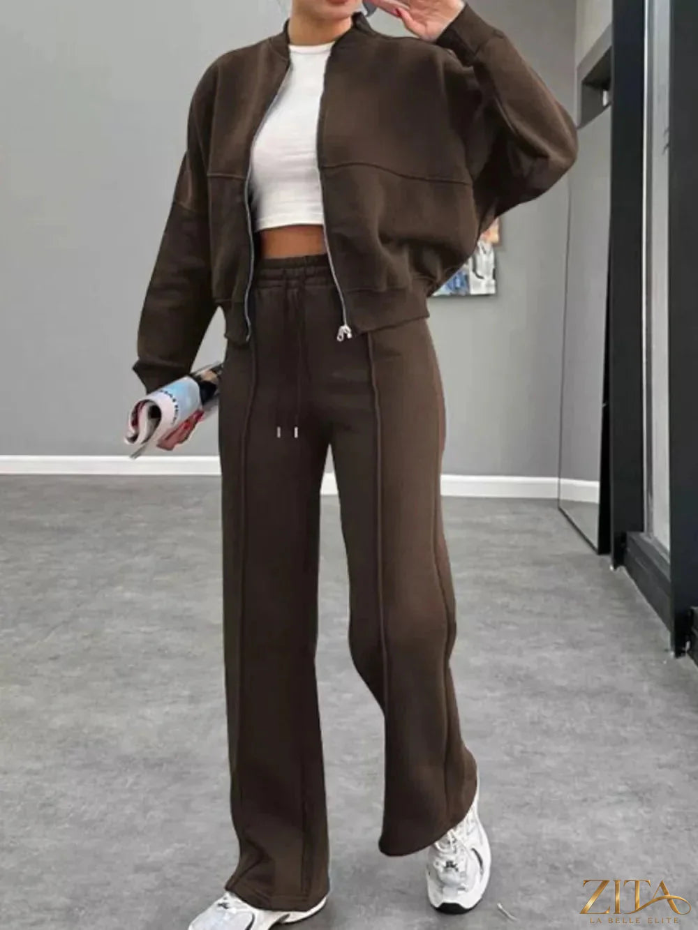 Zita La Belle Elite baseball collar zip-up outerwear and drawstring pants set, black and white casual athletic outfit.