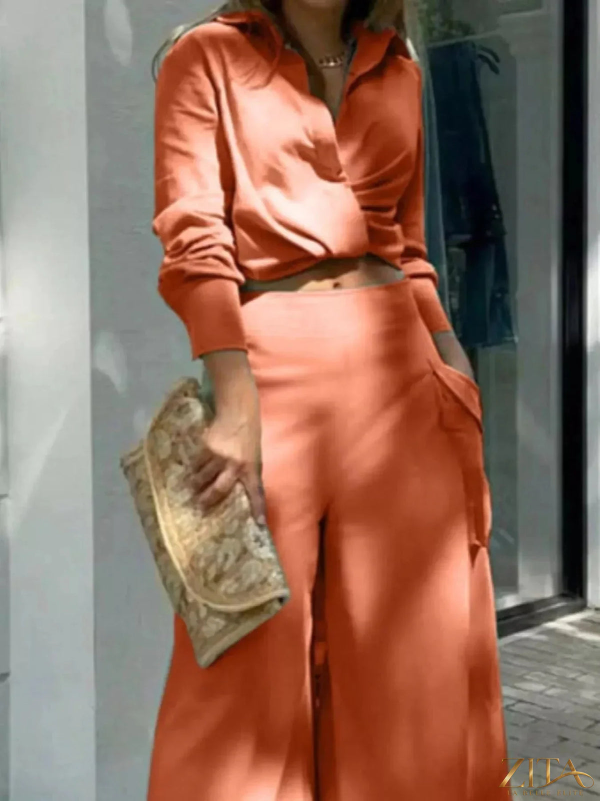Zita La Belle Elite long sleeve shirt and wide leg pants set in neutral fabric, displayed on a mannequin.