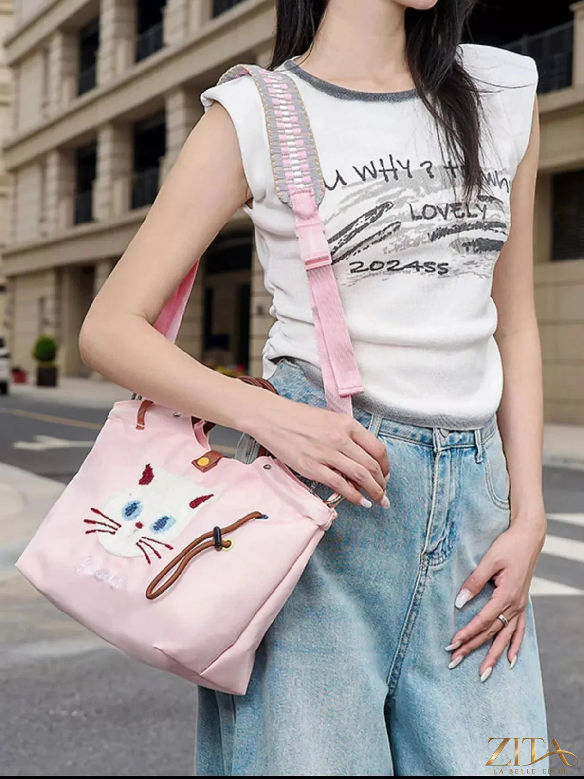 Embroidered cat tote bag by Zita La Belle Elite with adjustable shoulder strap, featuring colorful feline embroidery on fabric.