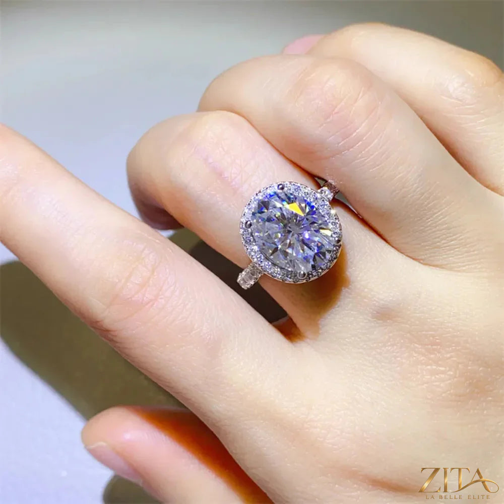 Sterling silver ring with a 5-carat moissanite gemstone, featuring a sleek and elegant design.
