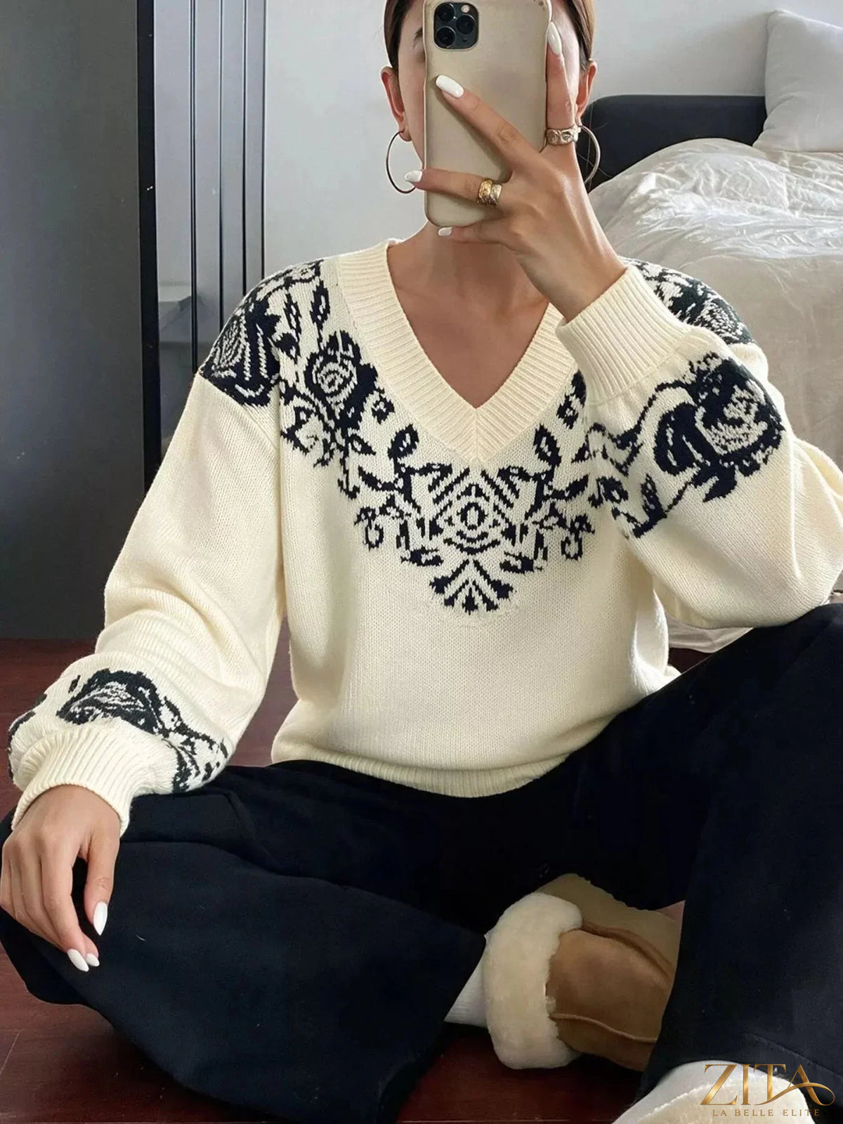 Zita La Belle Elite floral dropped shoulder sweater with colorful floral pattern and relaxed fit on a model.
