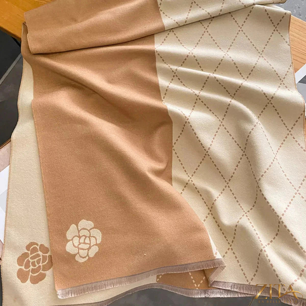 Raw hem scarf by Trendsi, featuring soft fabric and fringed edges, styled in a neutral beige color.