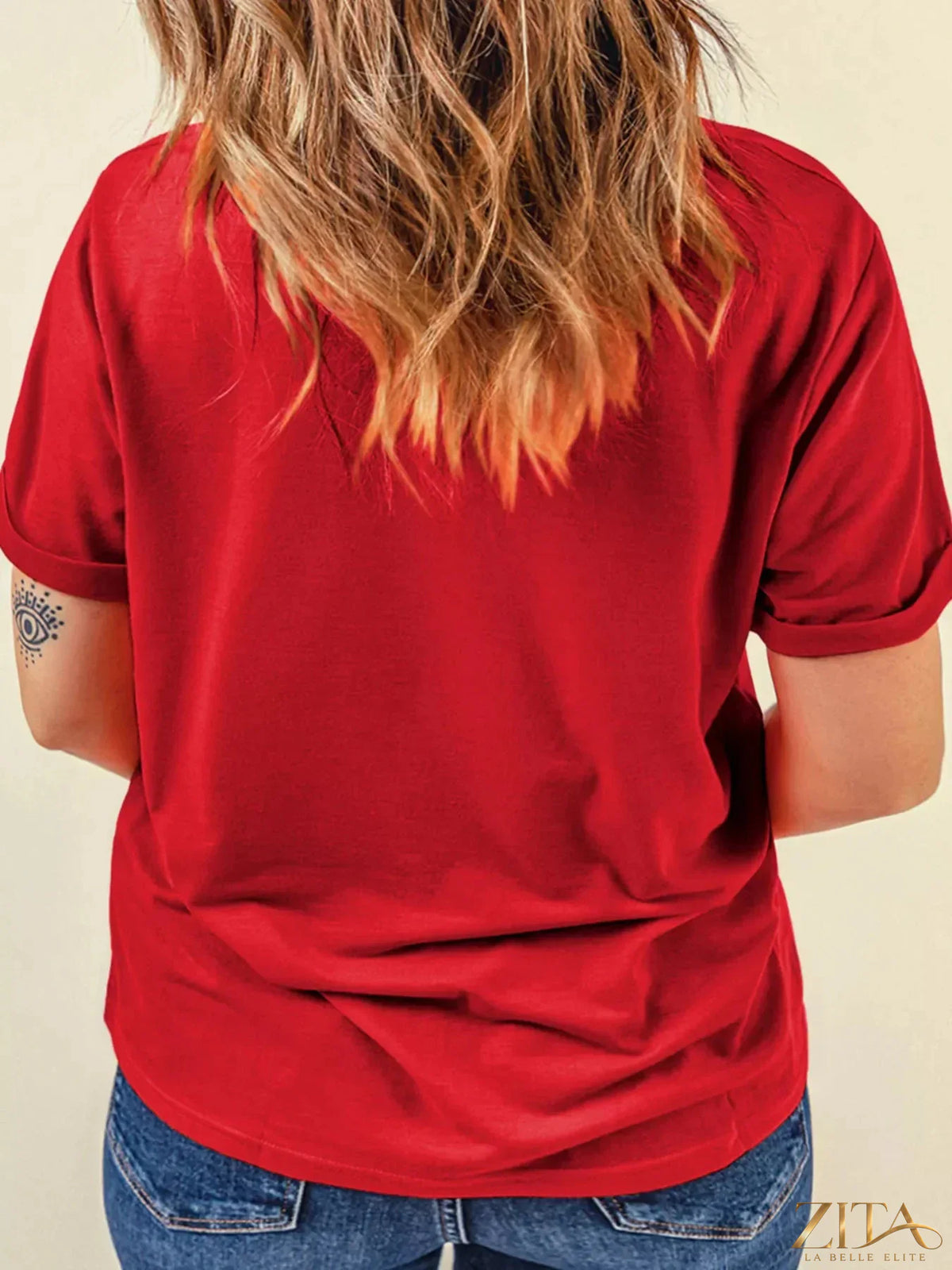 Red Merry Christmas short sleeve graphic tee from Trendsi featuring festive holiday design and bold holiday lettering.